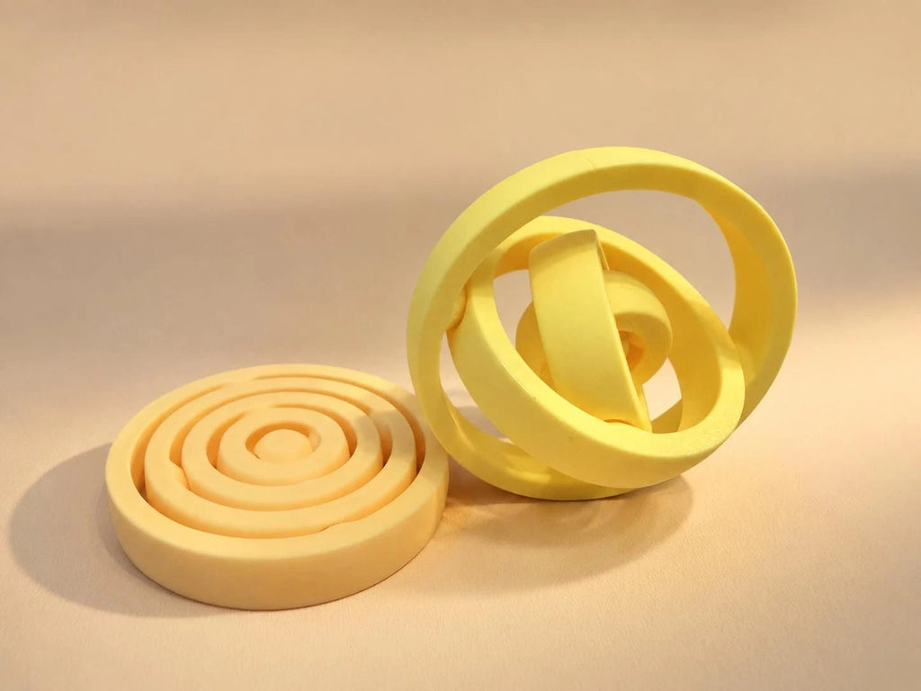 Yellow spinner with its connected rings extended